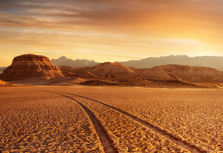 panoramic view death valley with some mountains on the back during sunsetの写真素材