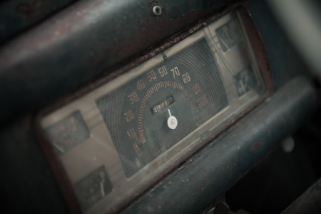 fragment of vintage old style automobile dash board disaturatedの写真素材