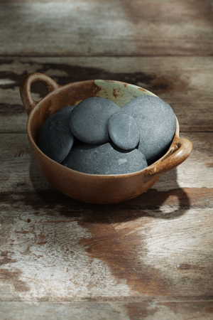 close up view of gray stones on color backの写真素材