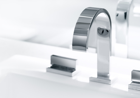 close up view of nice metal faucet in modern bathroom