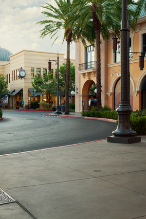 panoramic view of nice home town street during summer sunsetの写真素材