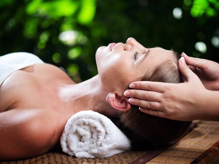 portrait of young beautiful woman in spa environment.の写真素材