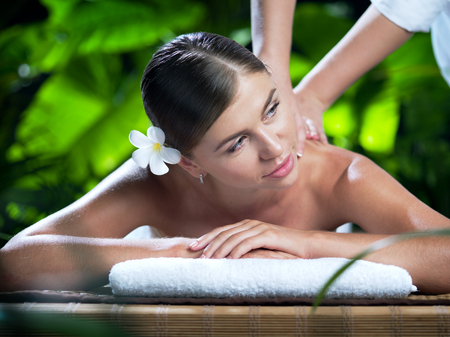 portrait of young beautiful woman in spa environment.の写真素材