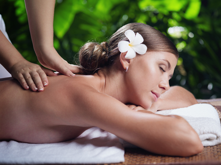 portrait of young beautiful woman in spa environment.の写真素材