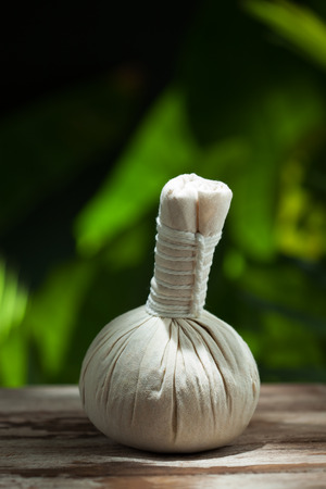 close up view of  white Herbal Compress on color back.の写真素材