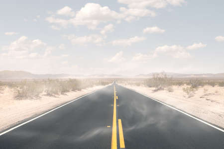 panoramic view of hot summer road through the Nevada  desertの写真素材