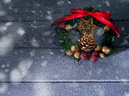 close up view of christmas and new year wreath on wooden backの写真素材