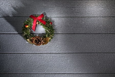 close up view of christmas and new year wreath on wooden backの写真素材