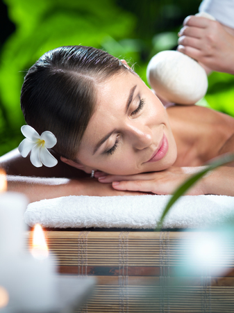 portrait of young beautiful woman in spa environment.の写真素材