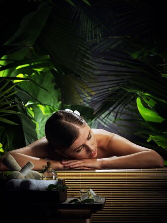 portrait of young beautiful woman in spa environment.の写真素材