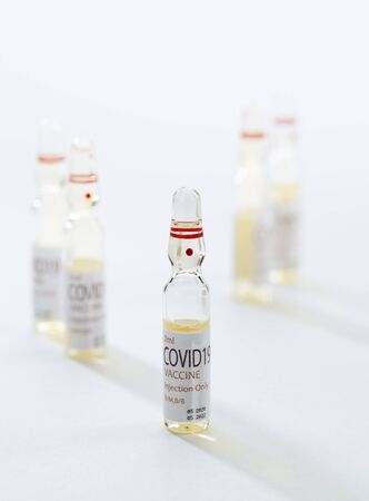 Close up view of the ampules with medicine on white backの写真素材