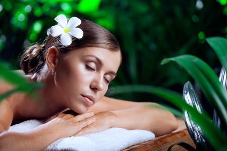 portrait of young beautiful woman in spa environment.の写真素材