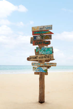 View of wooden signpost on summer tropic beachの写真素材