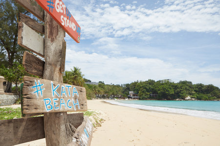 View of wooden signpost on summer tropic beachの写真素材