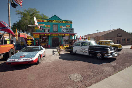 Williams, Arizona, USA: May 2014: Street scene with classic car in front of souvenir shops in...