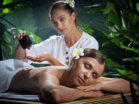 portrait of young beautiful woman in spa environment.の写真素材