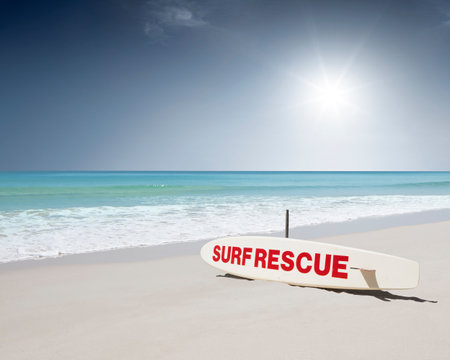 Close up view of rescue surf board on tropic beach backgroundの写真素材