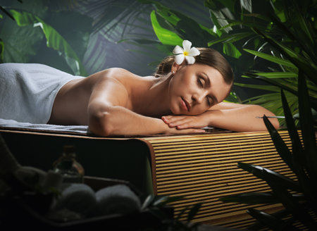 portrait of young beautiful woman in spa environmentの写真素材