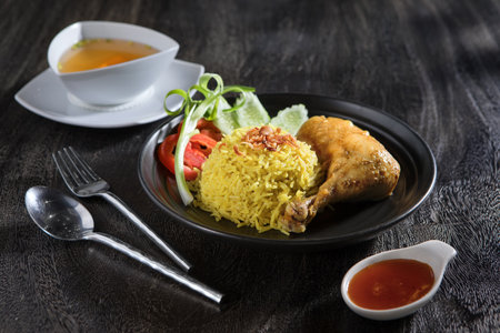 Close up view of yummy chicken with rice on grey backgroundの写真素材