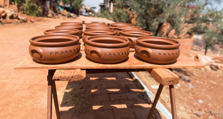 many Turkish traditional earthenware pot. turkish pot made of clay is a Guvec. Selective focus.の写真素材