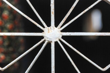 iron window frame front of black background. textureの写真素材