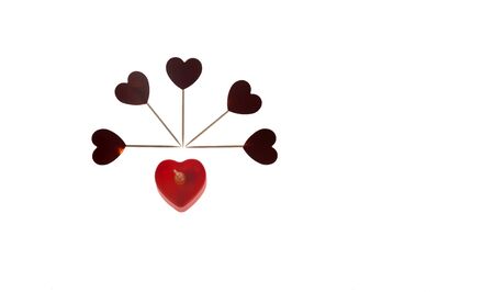 Red heart shapes isolated on white as design elements for Valentine's Day.の写真素材
