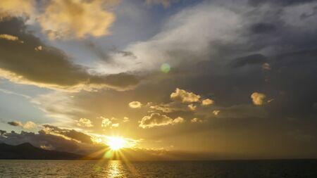 Time lapse dark storm clouds with background,Dark clouds before a sunset and thunder storm. 4Kの写真素材