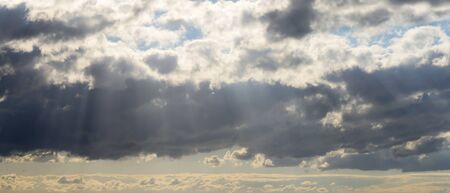 Dark sky with heavy and rainy clouds. Sky background.