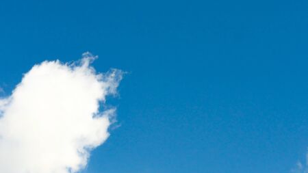 Blue sky background with white clouds. Nature.の写真素材