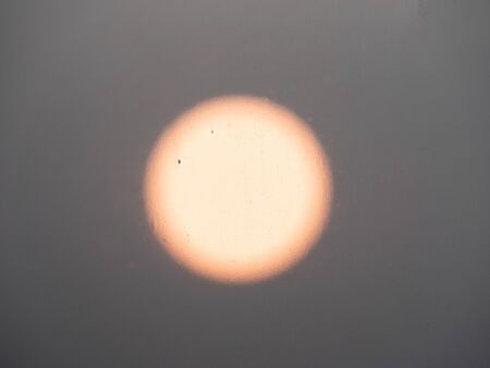 Blurred image of the sun at sunset, background