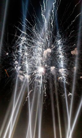 Colorful fireworks on the black sky background. Celebration.