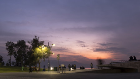 Turkey, izmir - November, 2017: view of People cross the bridge near the seaside at night in the Karsiyaka district, izmir city, Turkeyのeditorial素材
