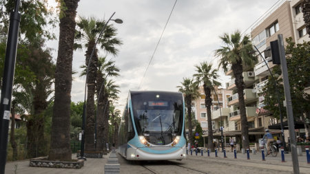 Izmir, Turkey - May 25, 2018: Izmir Tram at Bostanli, Karsiyaka. One of Public transportation in Izmir.のeditorial素材