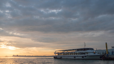 Izmir, Turkey - May 27, 2017 : Passengers getting in the city line ferry in Alsancak ferry pier. Izmir Turkey.のeditorial素材