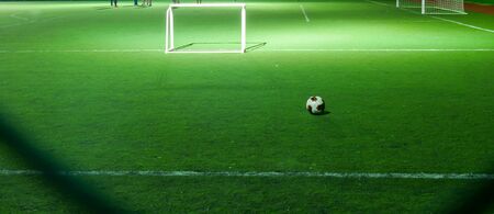 Small Football or Soccer Field with the Goal Post in the Night Time.の写真素材