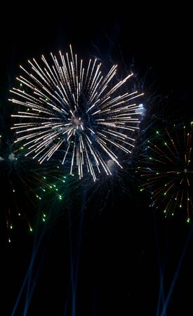 Colorful fireworks on the black sky background. Celebration.の写真素材