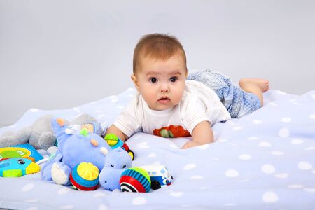 beautiful little baby , lie on stomachの写真素材