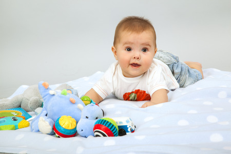beautiful little baby , lie on stomachの写真素材