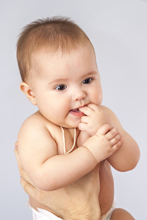 young father holding babyの写真素材