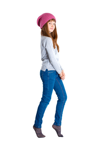 adorable smiling child girl wearing pink knitted hatの写真素材