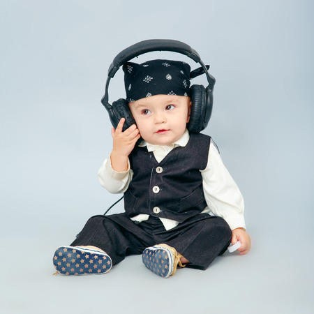 the beautiful baby with headphone, boyの写真素材