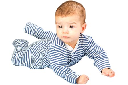the beautiful little baby, lie  on stomachの写真素材