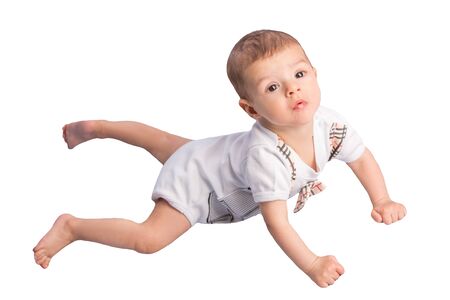 the beautiful little baby, lie  on stomachの写真素材