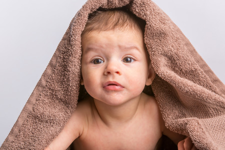 the little beautiful  baby under the towelの写真素材