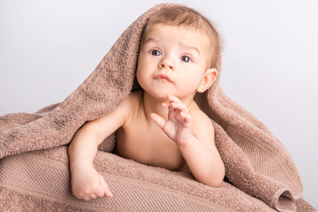 the little beautiful  baby under the towelの写真素材