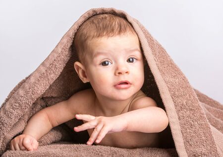 the little beautiful  baby under the towelの写真素材