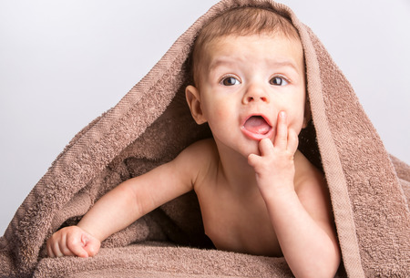 the little beautiful  baby under the towelの写真素材