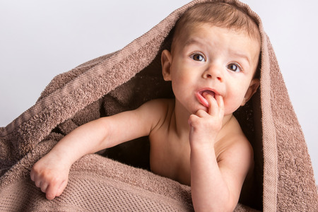 the little beautiful  baby under the towelの写真素材