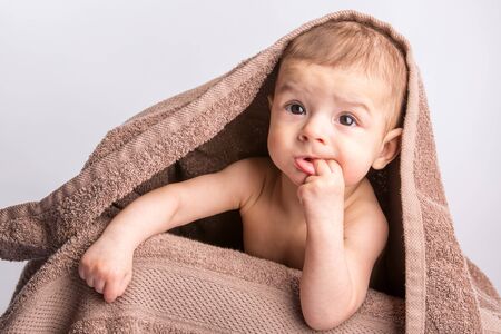 the little beautiful  baby under the towelの写真素材