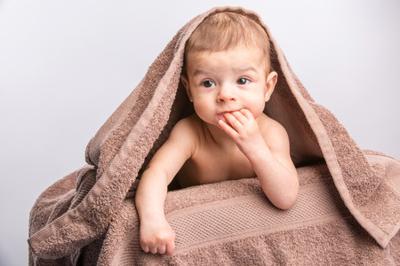 the little beautiful  baby under the towelの写真素材